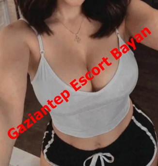 Promo image of a woman in a gray sports bra and black shorts with a red 'Gaziantep Escort Bayan' overlay, indicating an escort service ad.